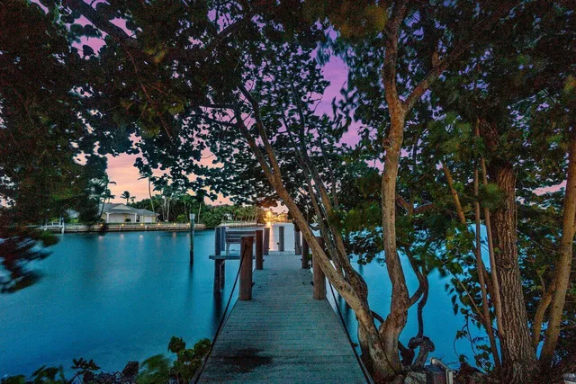 a view of a lake with sitting area