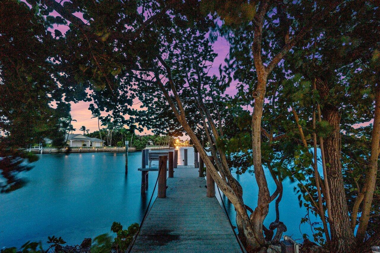 1620 Lands End Road Manalapan, FL 33462 - Photo 4 of 34 a view of a lake with sitting area