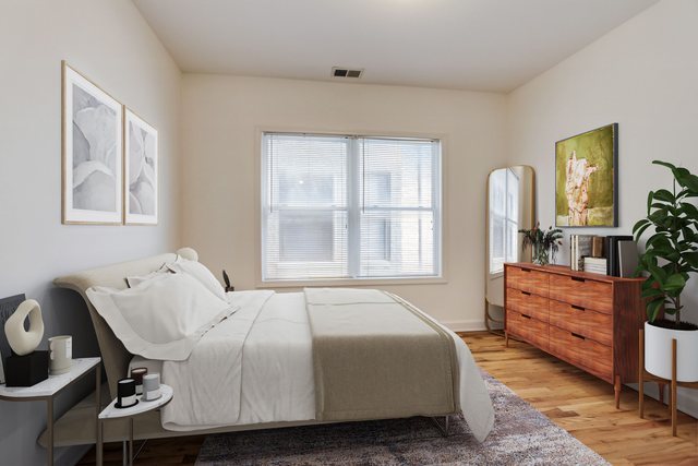 2457 West Harrison Street, Unit 3 Chicago, IL 60612 - Photo 12 of 20 a bedroom with a bed and window