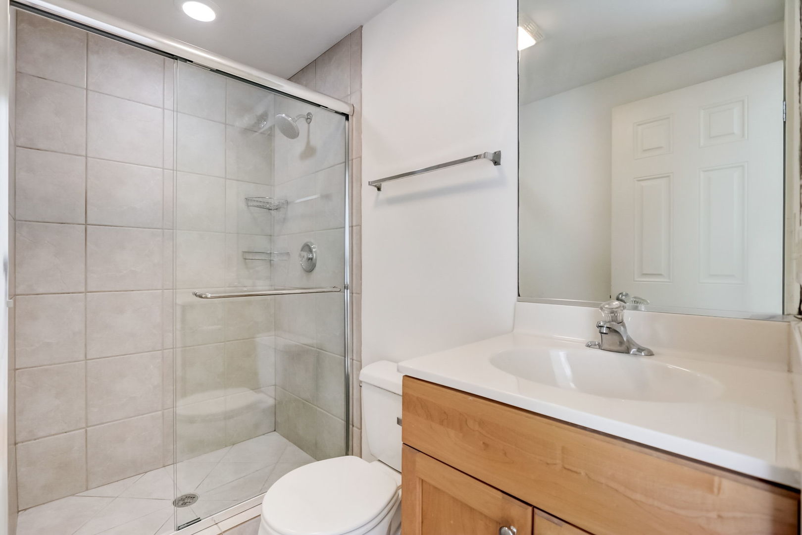 2457 West Harrison Street, Unit 3 Chicago, IL 60612 - Photo 14 of 20 a bathroom with a sink toilet and shower