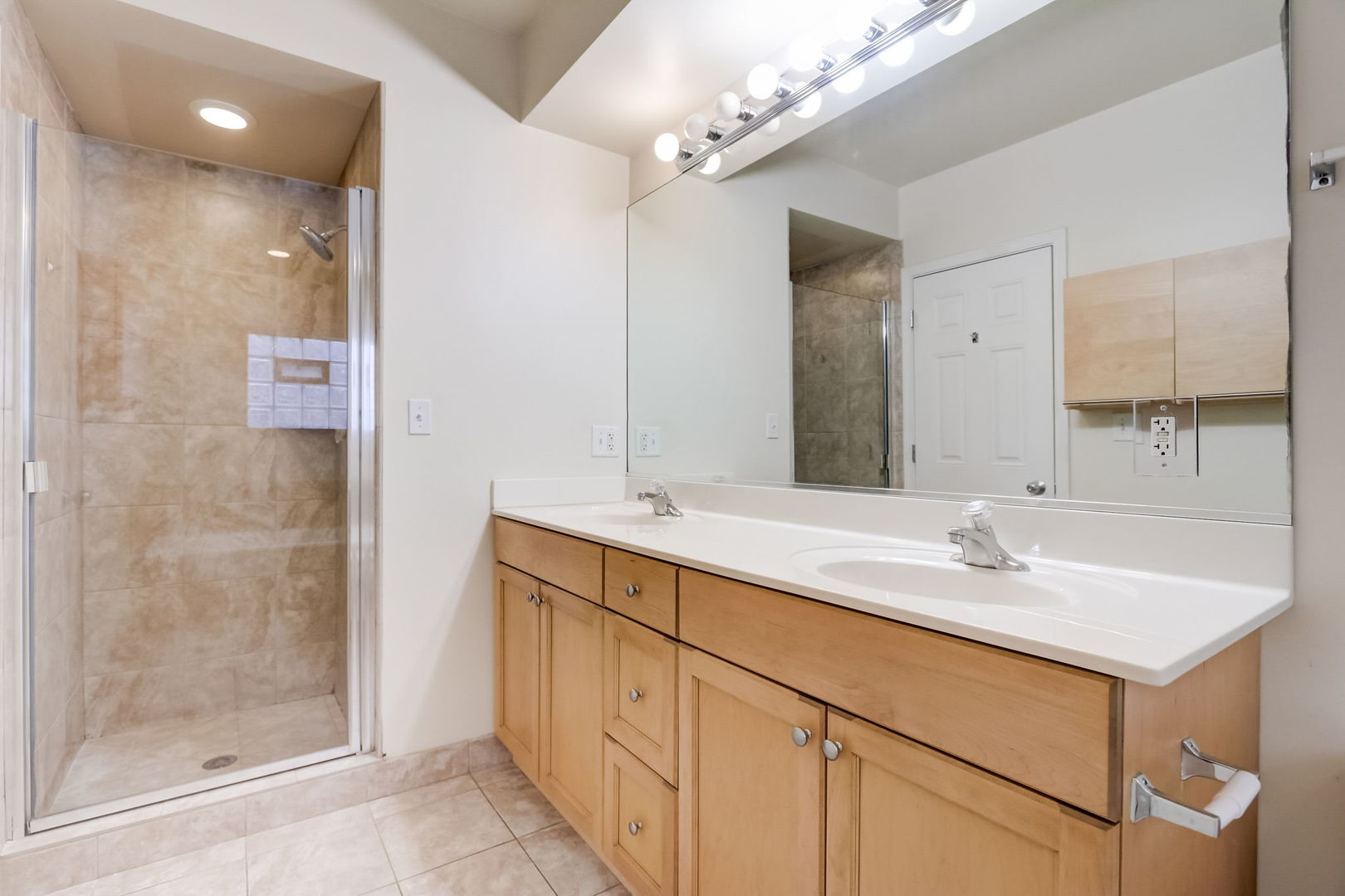 2457 West Harrison Street, Unit 3 Chicago, IL 60612 - Photo 15 of 20 a bathroom with a sink and a mirror
