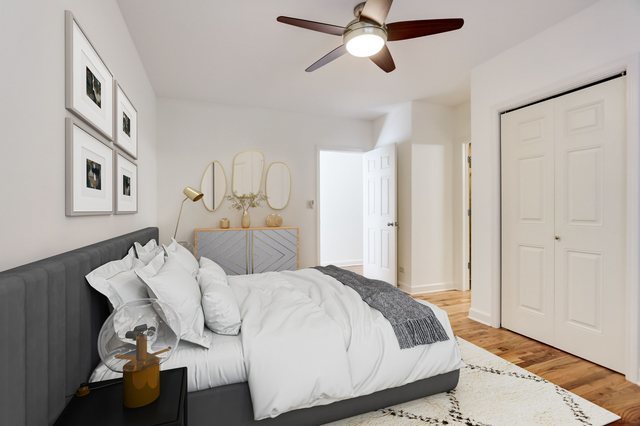 2457 West Harrison Street, Unit 3 Chicago, IL 60612 - Photo 8 of 20 a bedroom with a bed and wooden floor