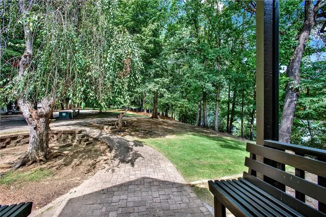 a bench sitting in front of a building