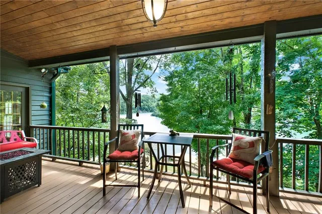 a view of a livingroom with furniture and a table