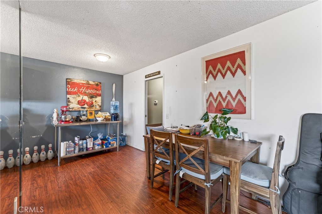 1688 Harding Street Seaside, CA 93955 - Photo 16 of 37 a view of a room with furniture and wooden floor