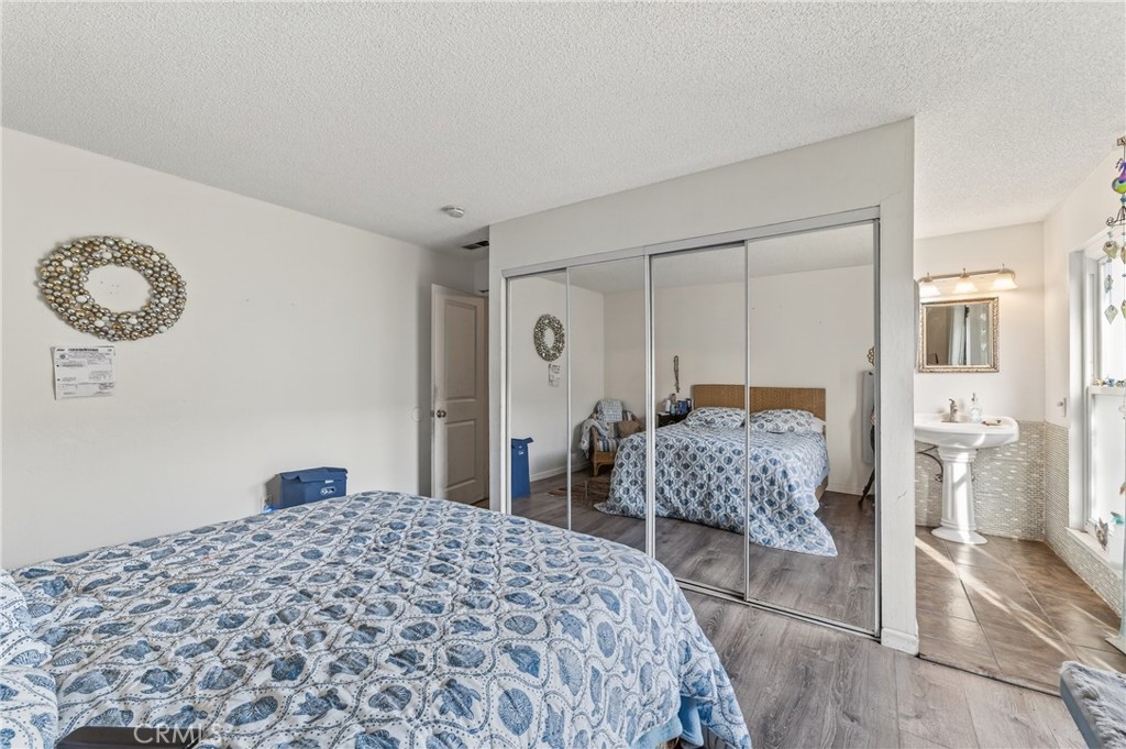 1688 Harding Street Seaside, CA 93955 - Photo 19 of 37 a bedroom with a bed and a couch