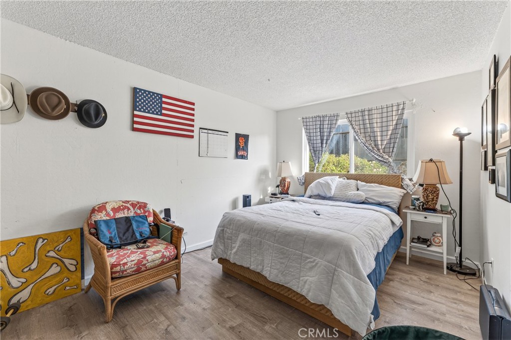 1688 Harding Street Seaside, CA 93955 - Photo 27 of 37 a bedroom with a bed and a couch