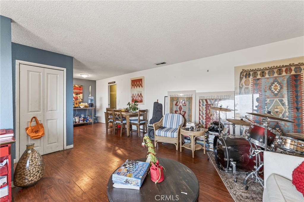 1688 Harding Street Seaside, CA 93955 - Photo 9 of 37 a living room with furniture and a window