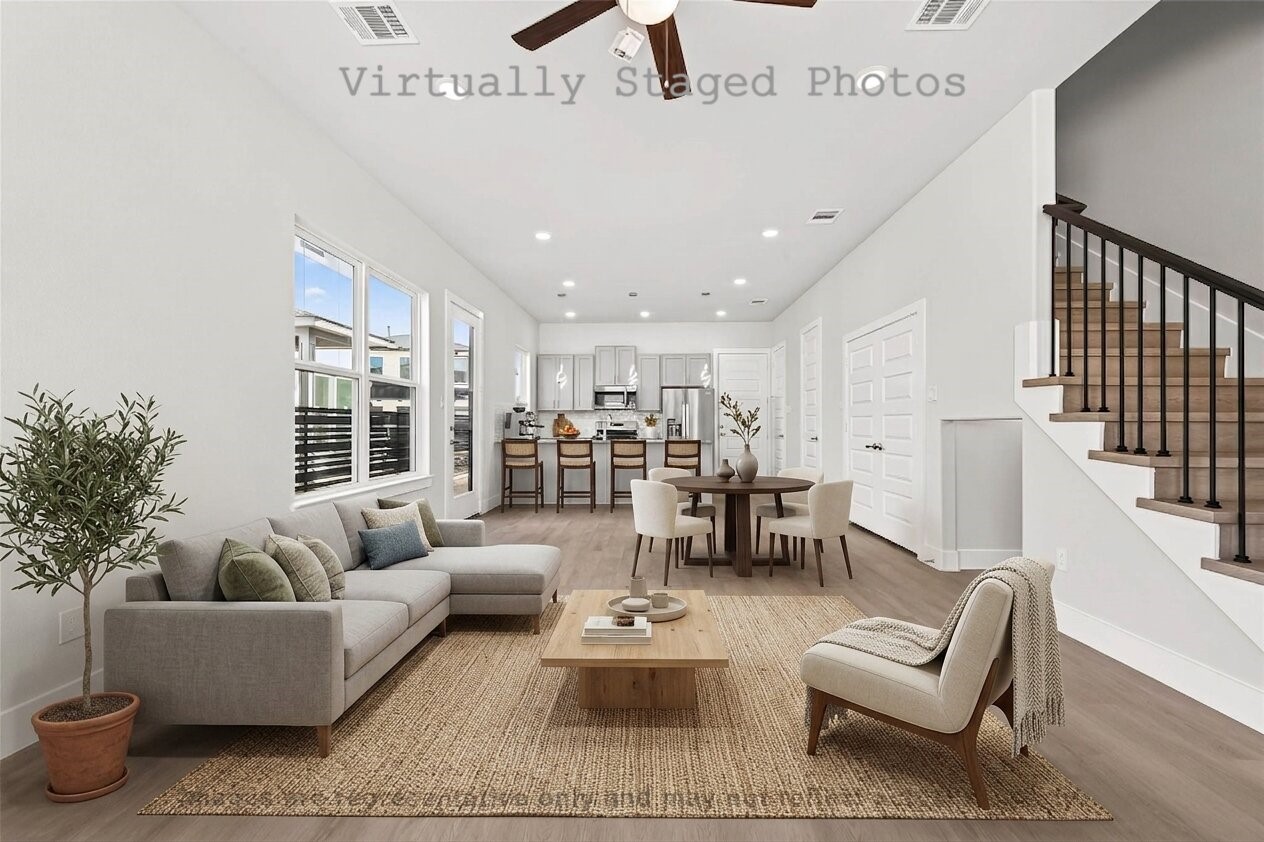 10719 Mason Road, Unit 26 Richmond, TX 77406 - Photo 3 of 50 Virtual Staging - Open-concept living and dining area features modern neutral furnishings, a textured woven rug, and seamless flow into a sleek gray kitchen