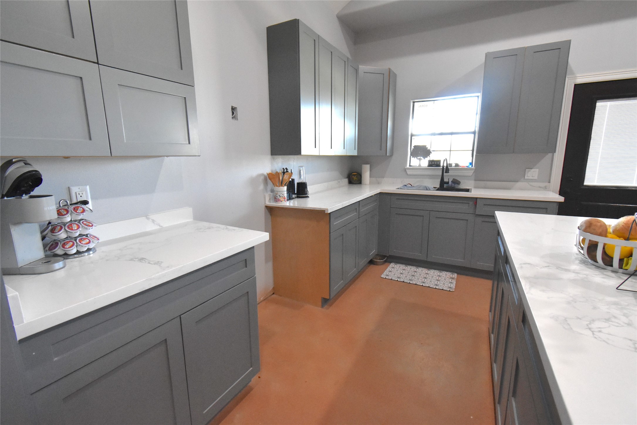 2991 Highway 83 Roma, TX 78584 - Photo 12 of 42 a kitchen with a sink stove and cabinets