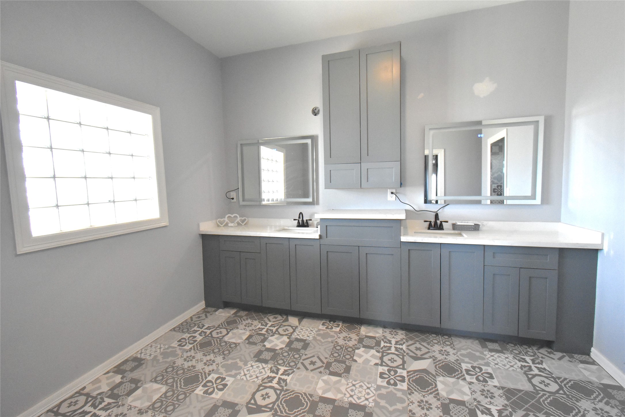 2991 Highway 83 Roma, TX 78584 - Photo 18 of 42 a bathroom with a sink and a mirror