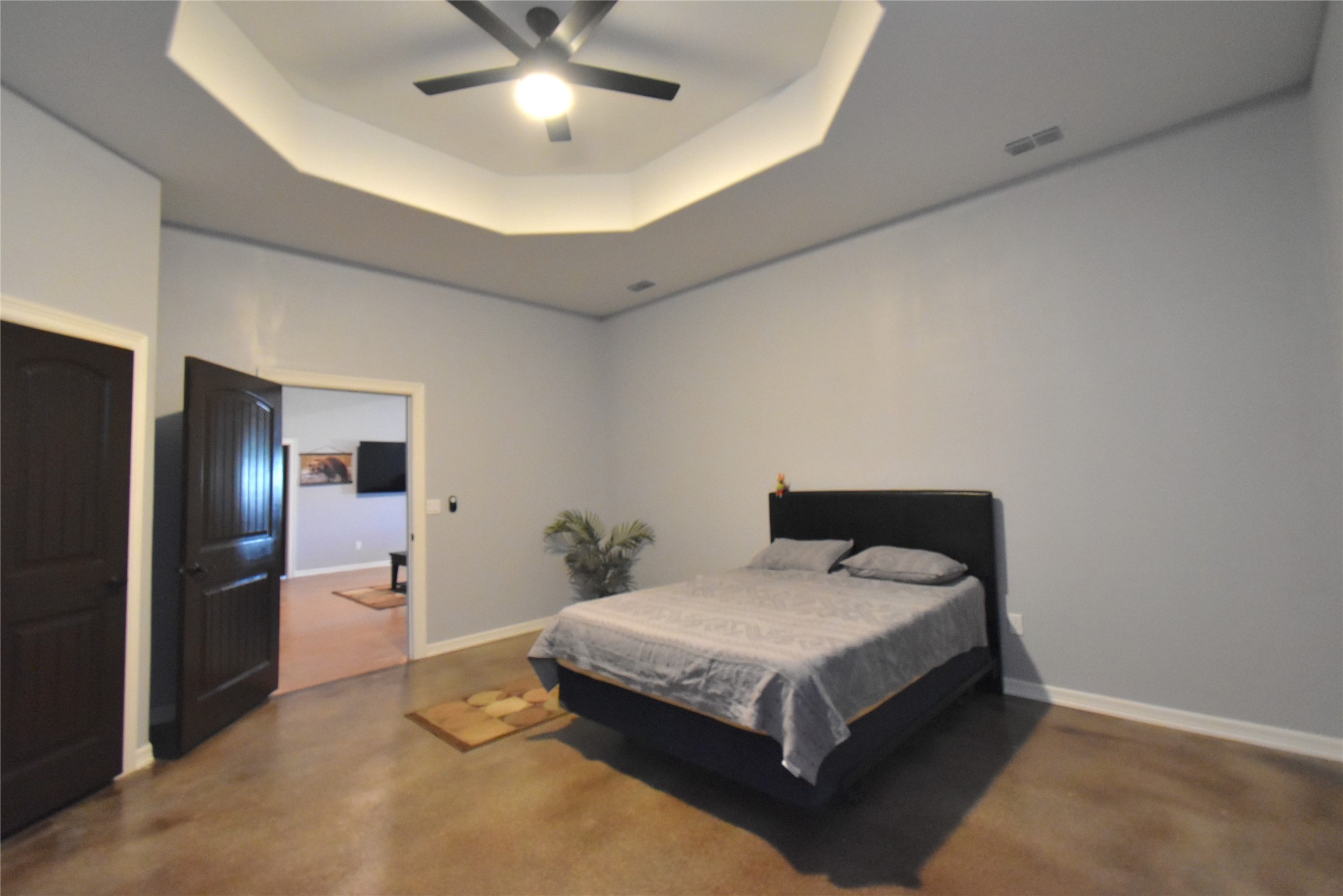 2991 Highway 83 Roma, TX 78584 - Photo 22 of 42 a bedroom with a bed and ceiling fan