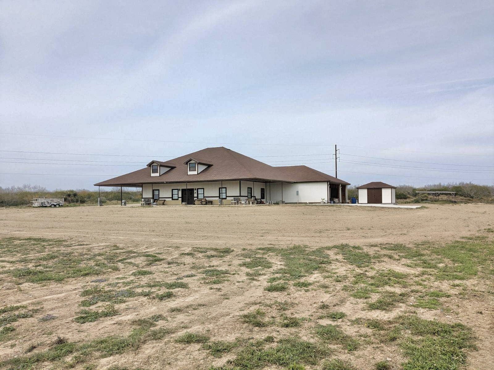 2991 Highway 83 Roma, TX 78584 - Photo 5 of 42 a view of a big room with an ocean and mountain in the back