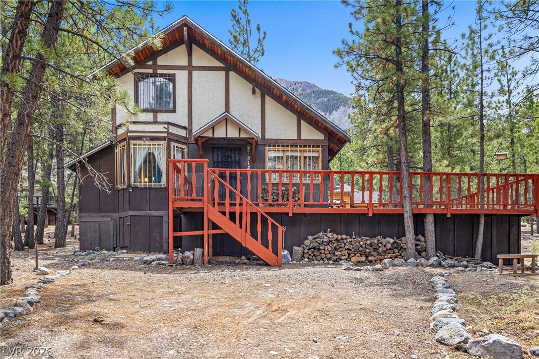 2146 Via Spes Nostra Street Mount Charleston, NV 89124 - Photo 1 of 33 Perched amongst towering pines, this mountain chalet features an inviting wrap-around deck.