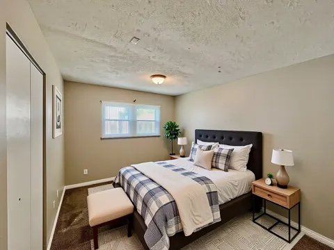 829 Princeton Avenue Matteson, IL 60443 - Photo 14 of 20 a bedroom with a bed and a window