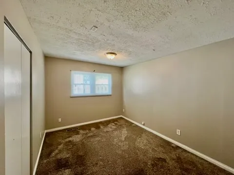 a view of a room with a window