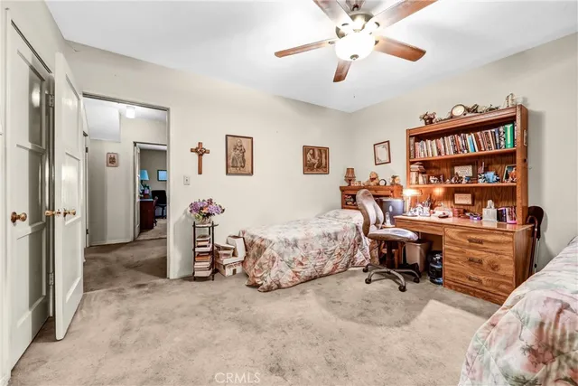 a bedroom with furniture and a bed