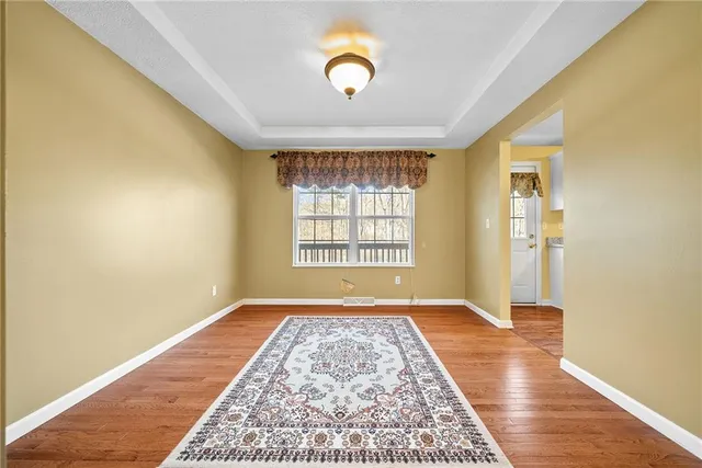 a view of an empty room and window