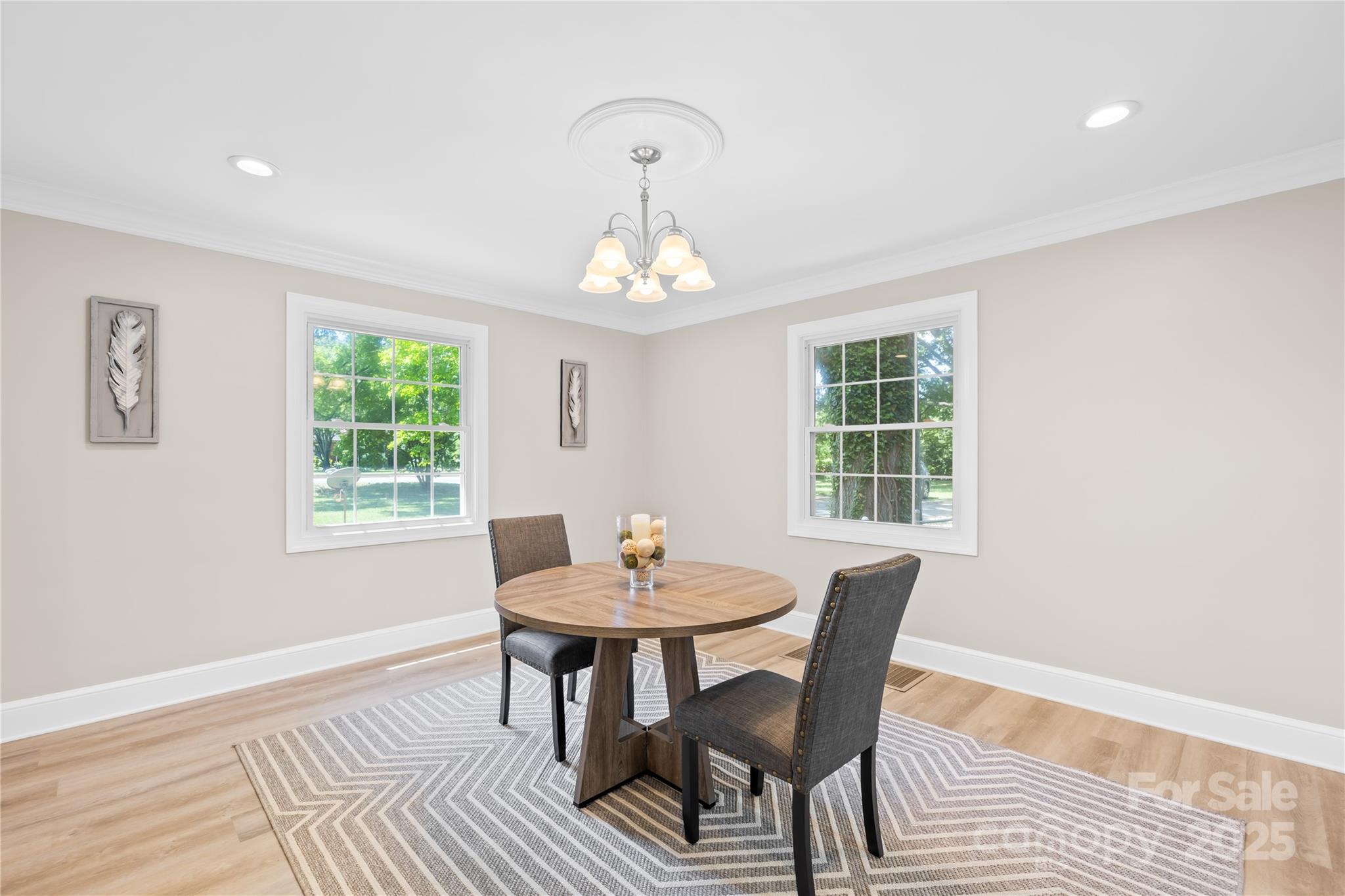 6012 Tuckaseegee Road Charlotte, NC 28208 - Photo 8 of 30 a dining room with furniture and window
