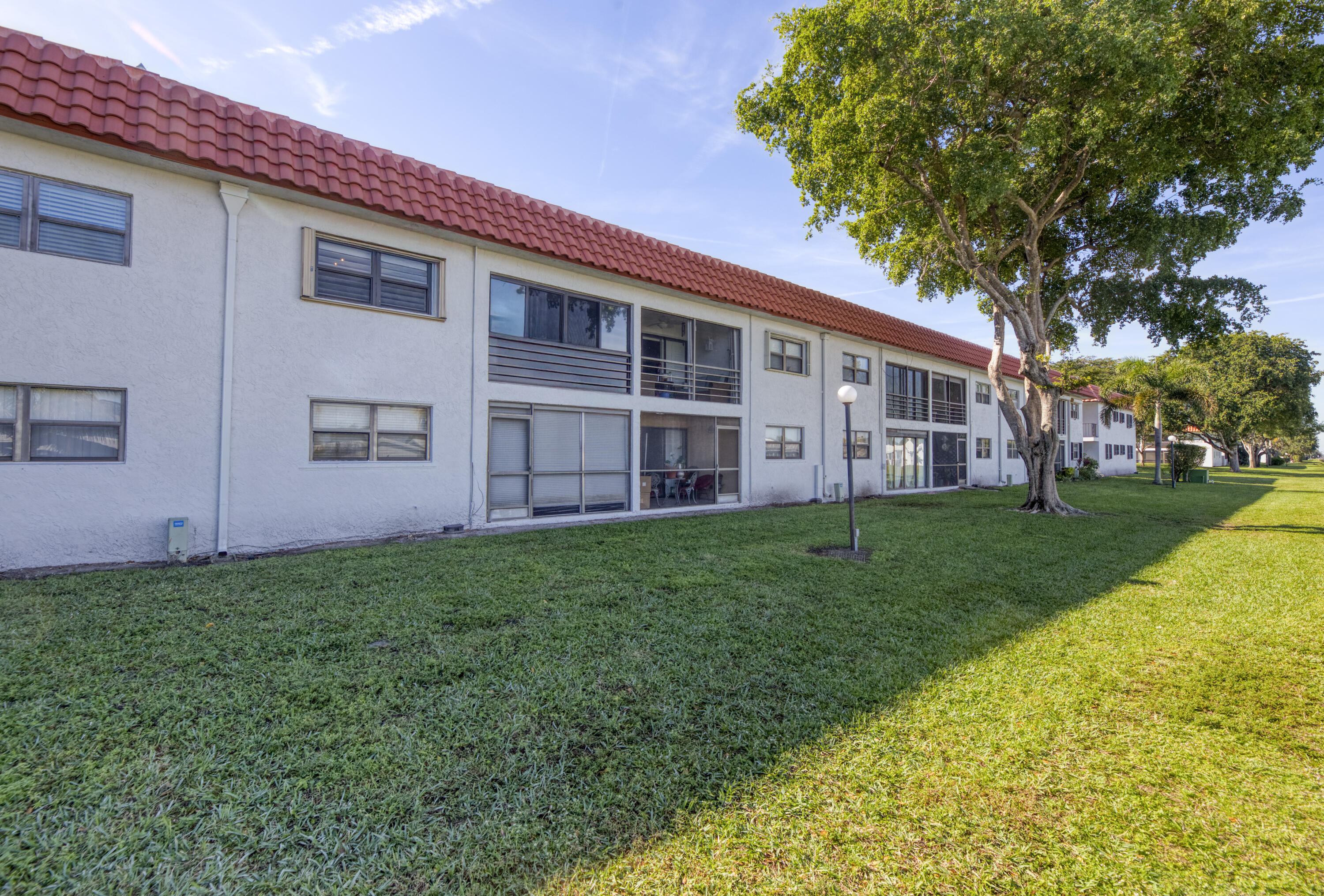 1901 Woolbright Road, Unit A203 Boynton Beach, FL 33426 - Photo 28 of 32 BACK OF BUILDING