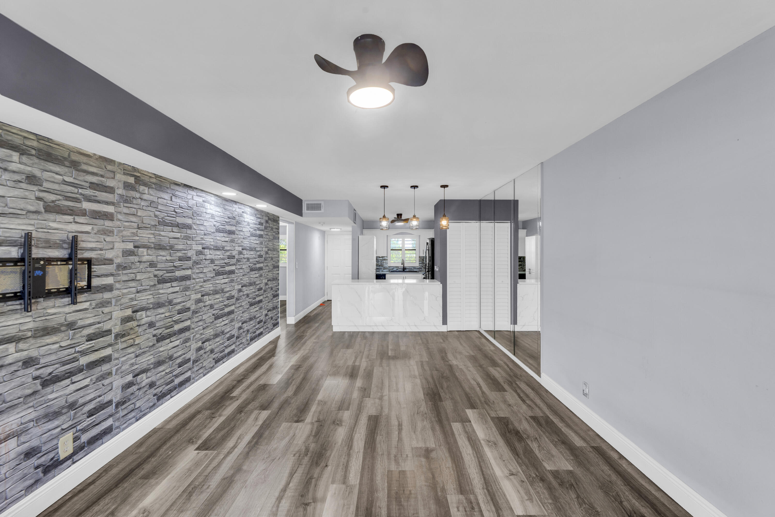 1901 Woolbright Road, Unit A203 Boynton Beach, FL 33426 - Photo 3 of 32 LIVING ROOM AND DINING ROOM