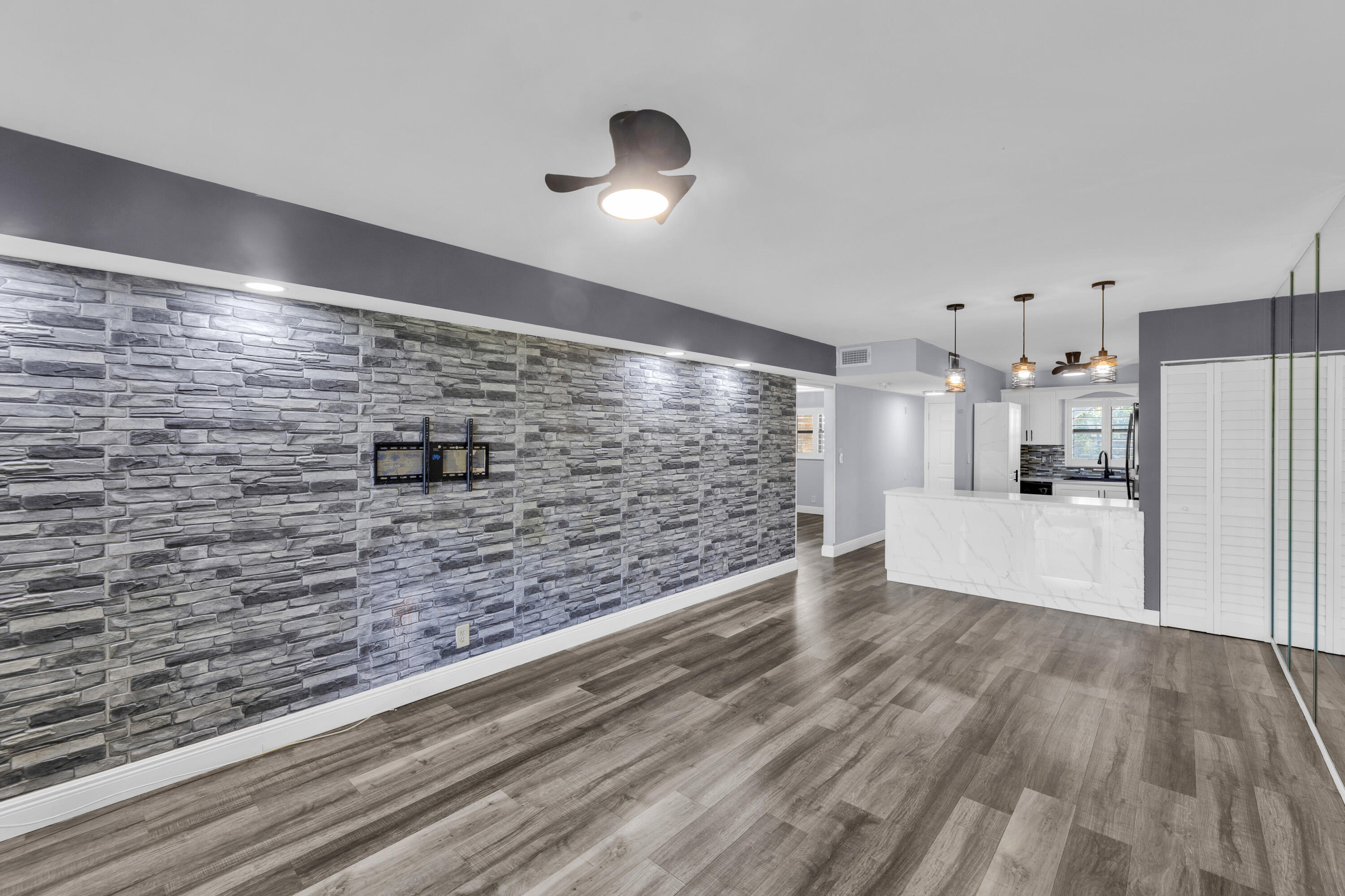 1901 Woolbright Road, Unit A203 Boynton Beach, FL 33426 - Photo 4 of 32 LIVING ROOM AND DINING ROOM 2