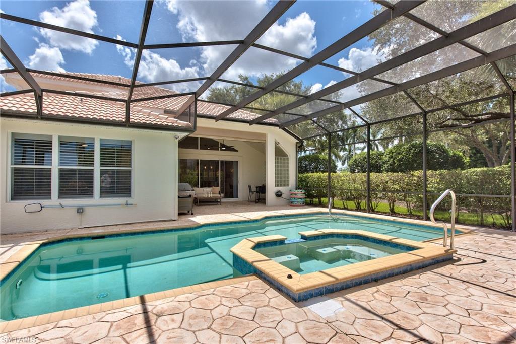 1705 Marsh Run Naples, FL 34109 - Photo 33 of 40 a view of a swimming pool with a patio