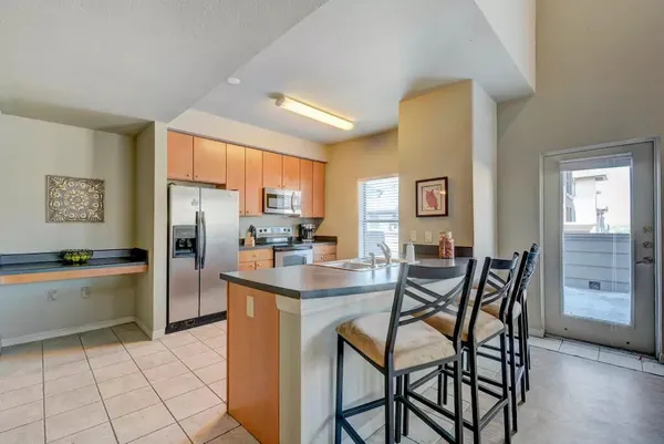 a view of a kitchen and dining room