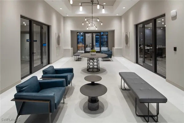 a kitchen with a table and chairs in it