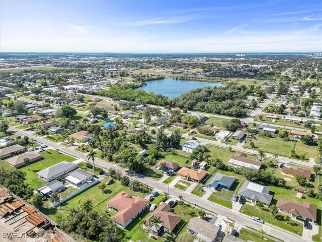 an aerial view of residential building with parking space