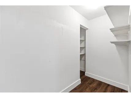 a view of small space with racks on the wall