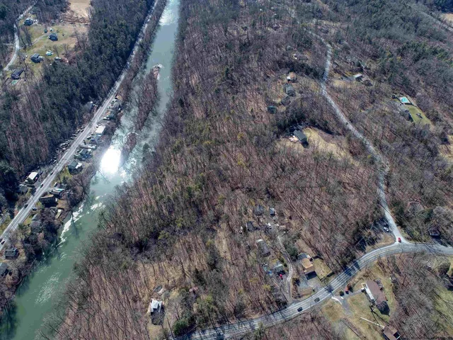 a aerial view of a house with a yard