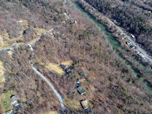 a view of a backyard of the house