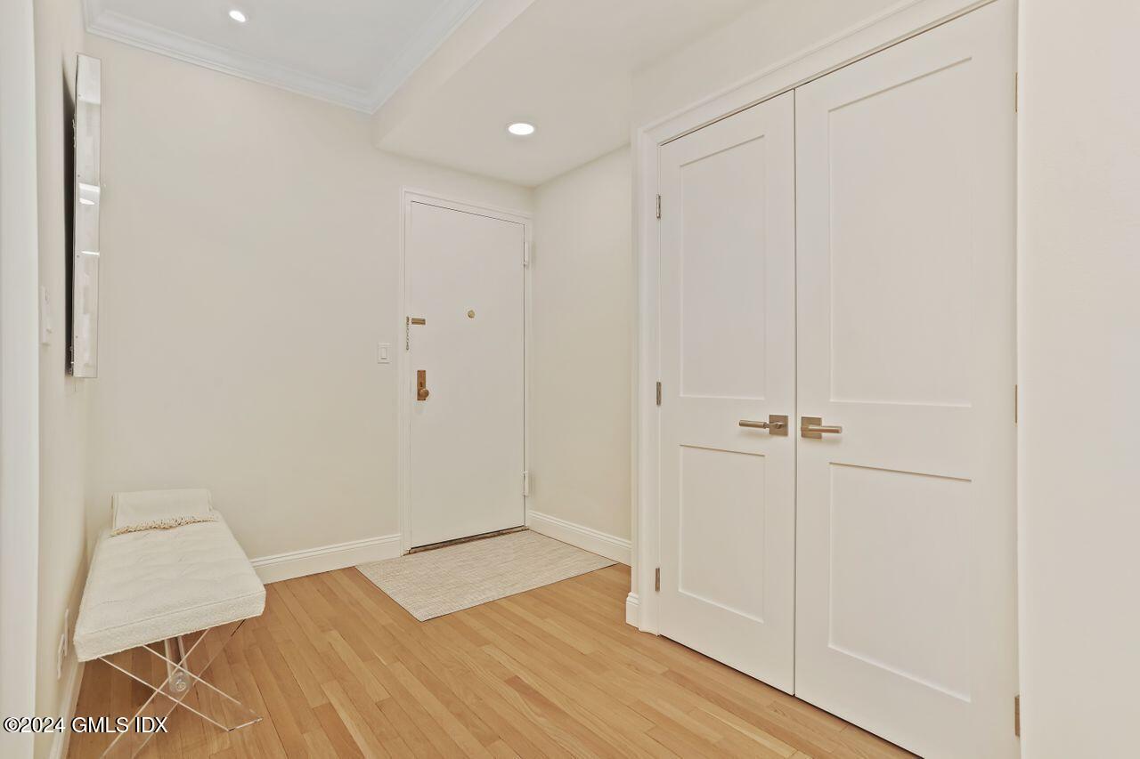 40 West Elm Street, Unit 3G Greenwich, CT 06830 - Photo 17 of 20 a view of a room with wooden floor