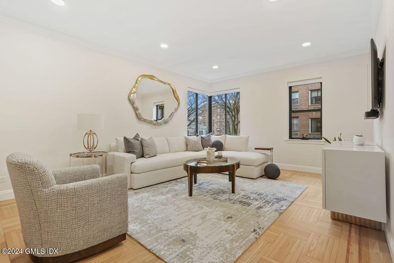 40 West Elm Street, Unit 3G Greenwich, CT 06830 - Photo 9 of 20 a living room with furniture and a wooden floor