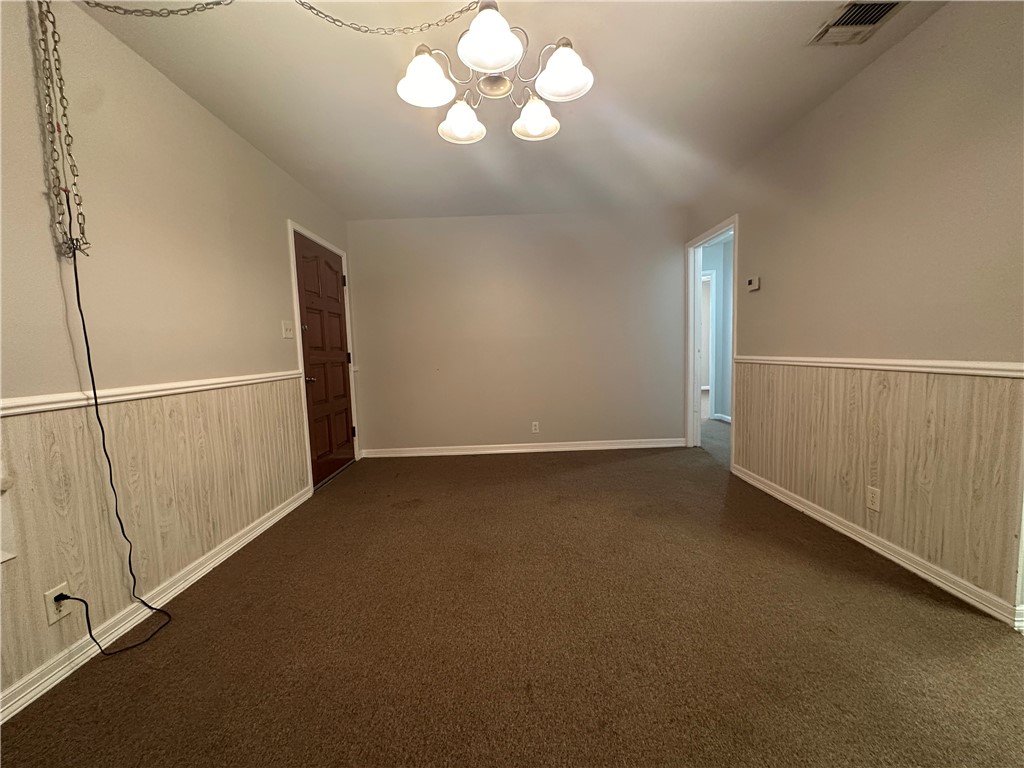 1133 Austin Street Portland, TX 78374 - Photo 3 of 32 a view of an empty room with a window