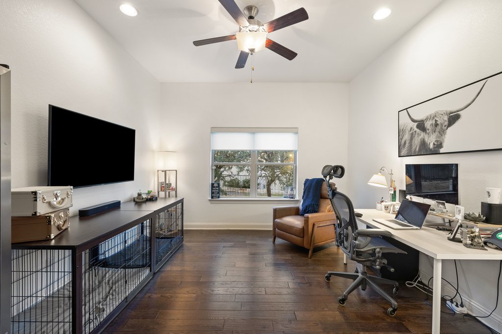 207 San Siro Cove Austin, TX 78738 - Photo 11 of 40 Versatile office with wood floors could also be used as a downstairs playroom, workout room or additional living space.