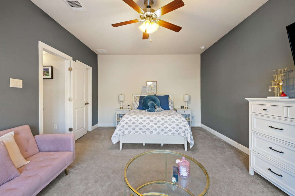 207 San Siro Cove Austin, TX 78738 - Photo 12 of 40 The upstairs bedroom is large enough to have it's own sitting area!