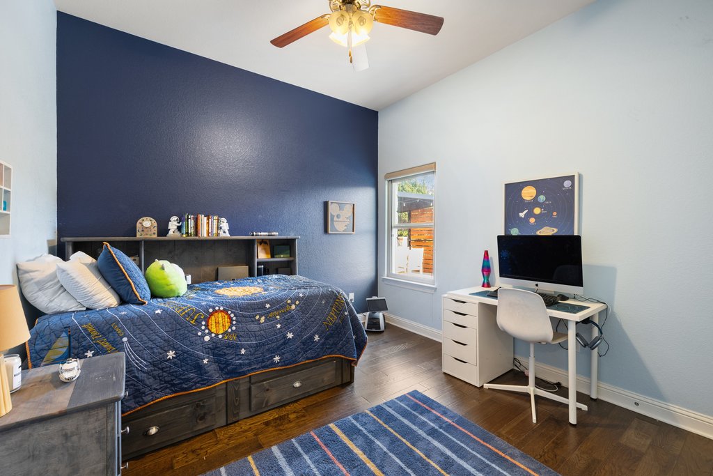 207 San Siro Cove Austin, TX 78738 - Photo 25 of 40 This bedroom has a view of the spa and can hear the peacefulness of the pool fountains. It also has a massive closet!