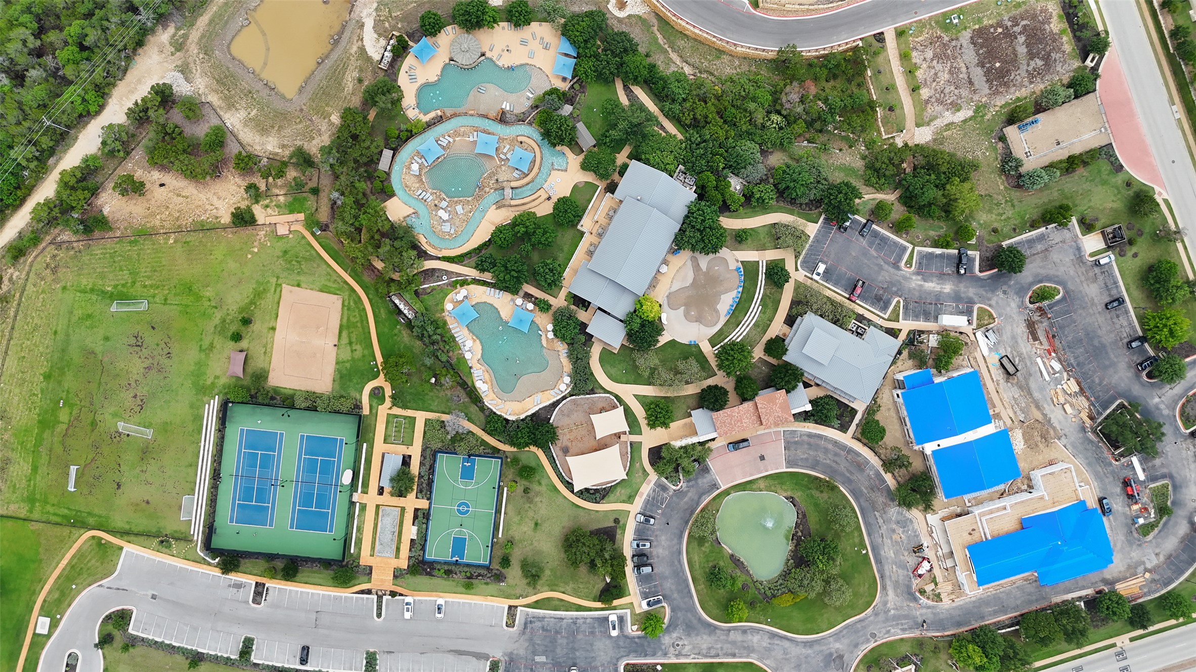 207 San Siro Cove Austin, TX 78738 - Photo 40 of 40 Rough Hollow has so much to offer! From pickleball courts, sand volleyball, basketball and soccer fields to a lazy river, multiple pools, splash pad, playground and pavilion. And even a dog park for your furry friends!