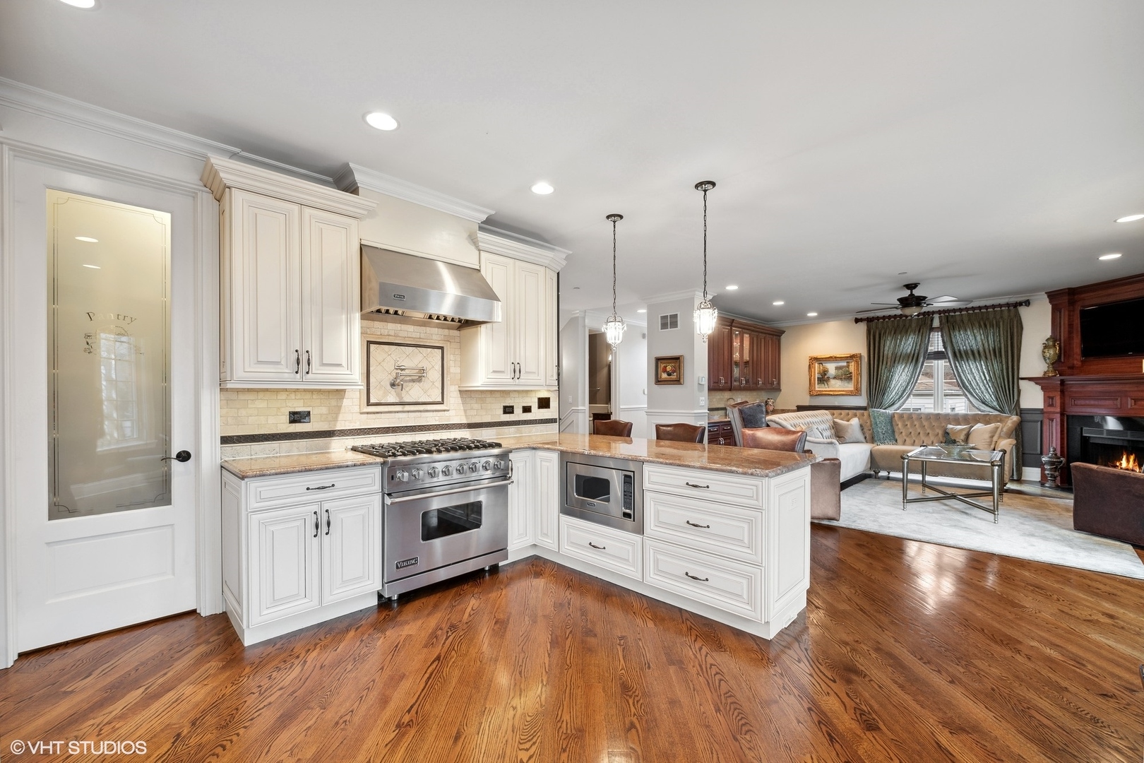 1761 Elliott Street Park Ridge, IL 60068 - Photo 9 of 37 a large kitchen with cabinets and wooden floor