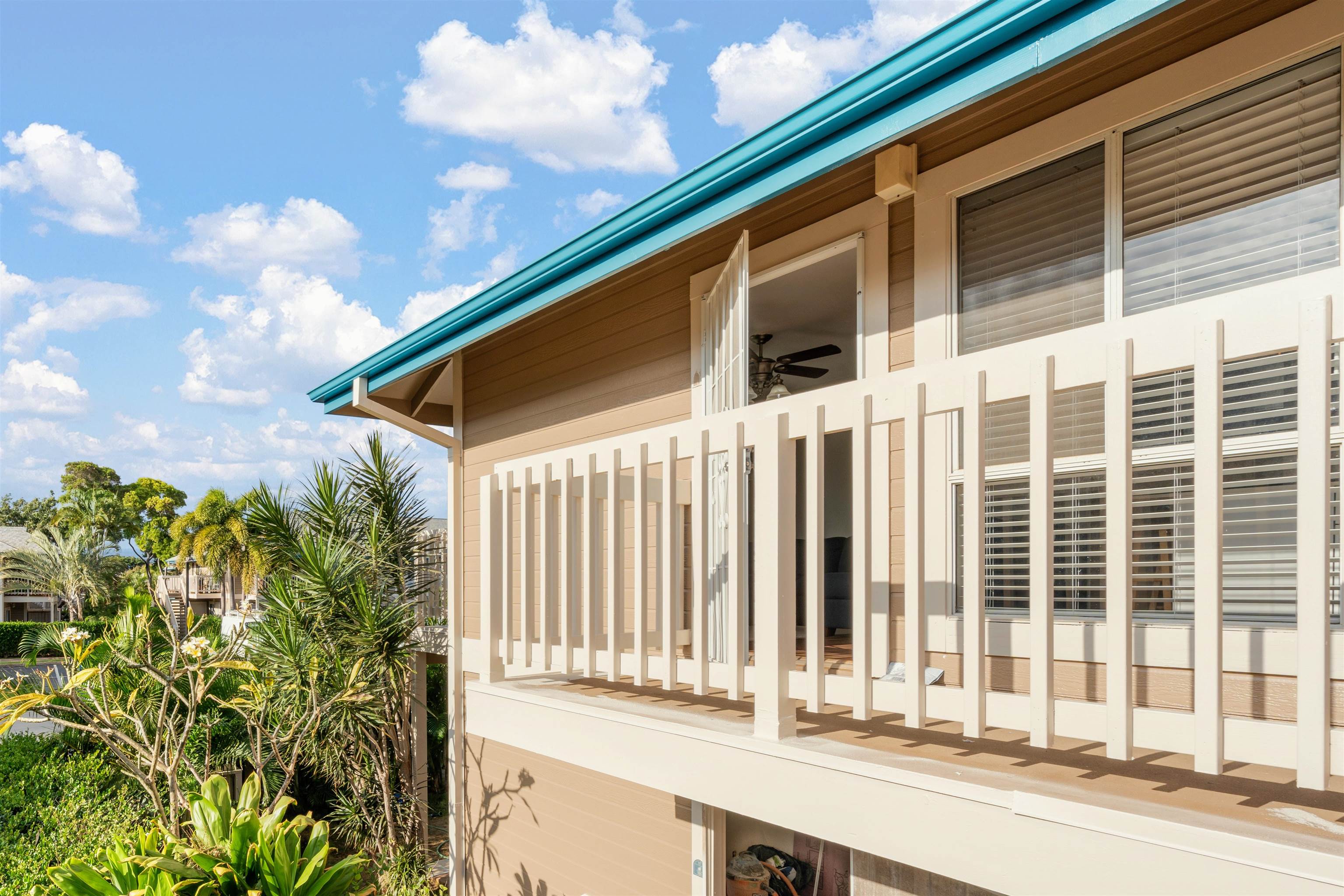 480 Kenolio Road, Unit 11206 Kihei, HI 96753 - Photo 22 of 31 a view of a house with a backyard