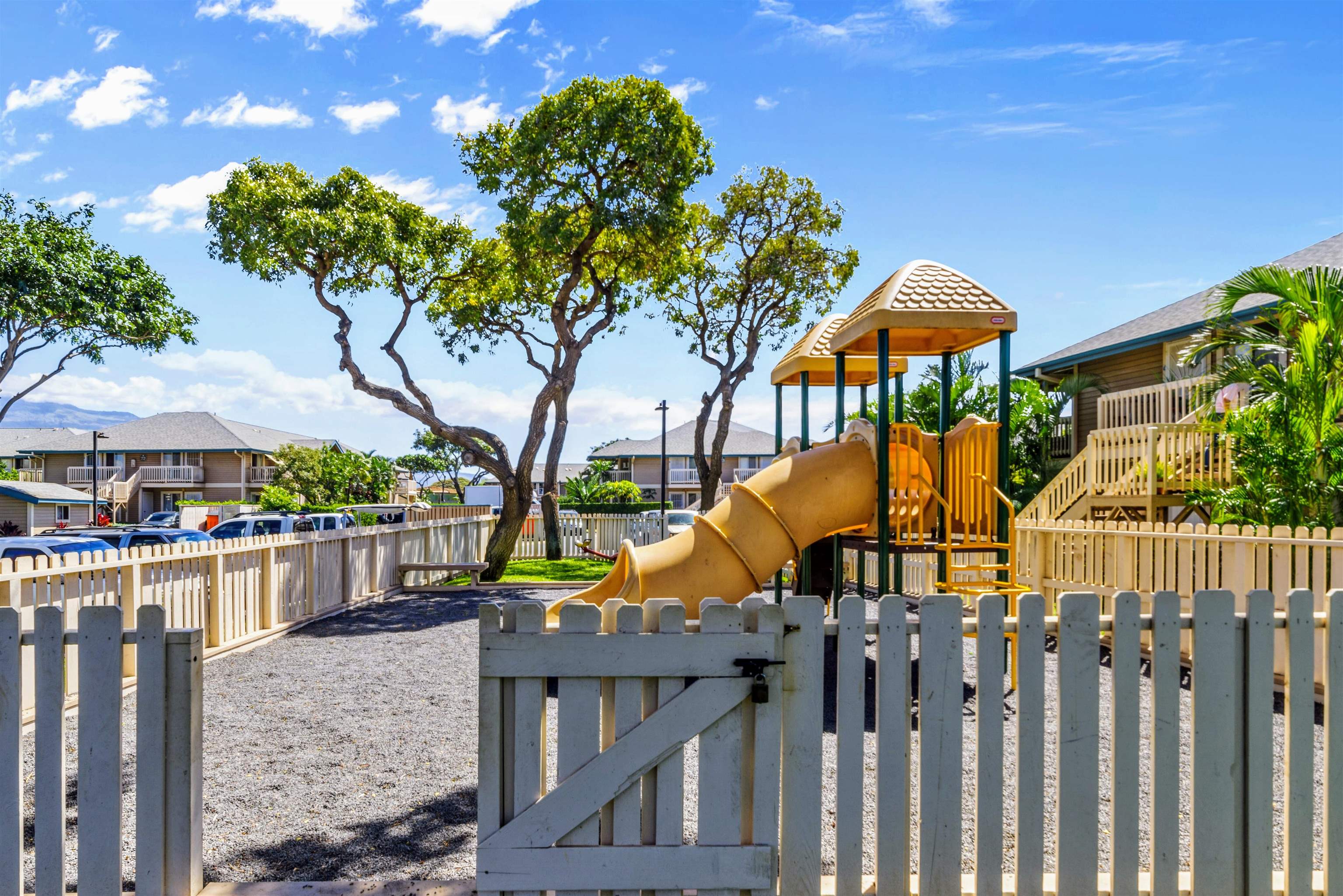 480 Kenolio Road, Unit 11206 Kihei, HI 96753 - Photo 28 of 31 a view of a house with a yard