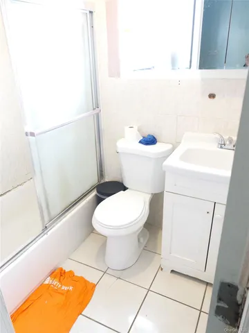 a bathroom with a toilet and a sink