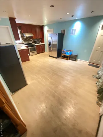 a view of a kitchen with a sink