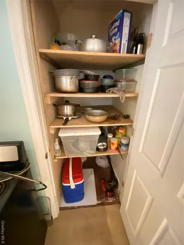 a room with storage and utility