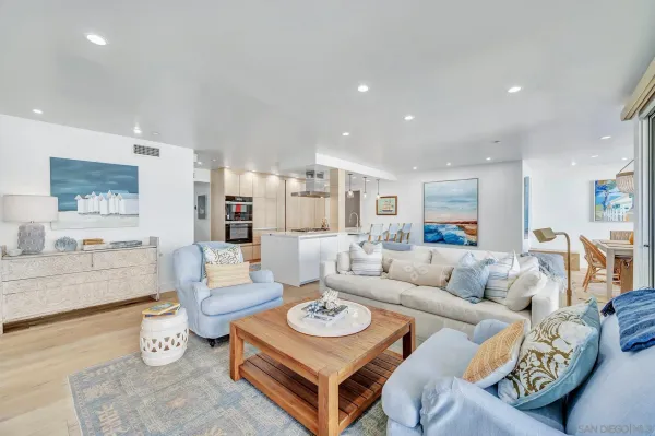 a living room with furniture and a table