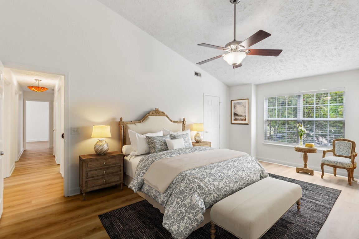 1948 Portway Road Spring Hill, TN 37174 - Photo 19 of 28 a bedroom with a bed and wooden floor
