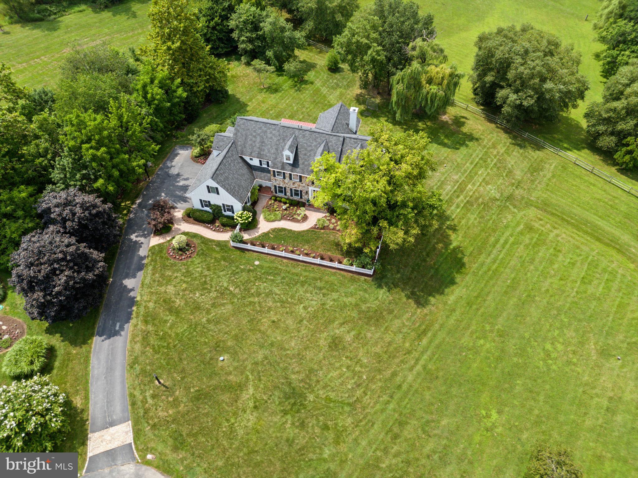 740 Monument Road Malvern, PA 19355 - Photo 3 of 51 an aerial view of a house with a yard basket ball court and outdoor seating