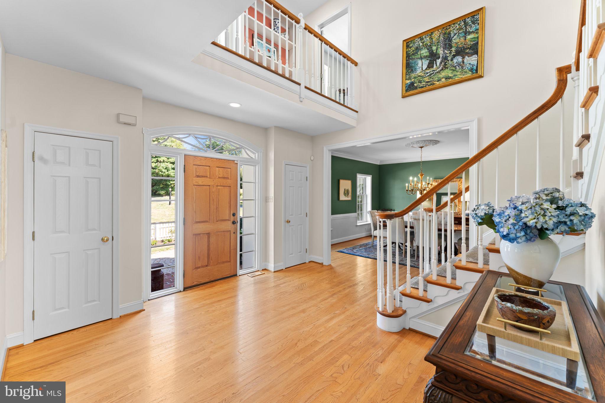 740 Monument Road Malvern, PA 19355 - Photo 5 of 51 a view of entryway with wooden floor and stairs